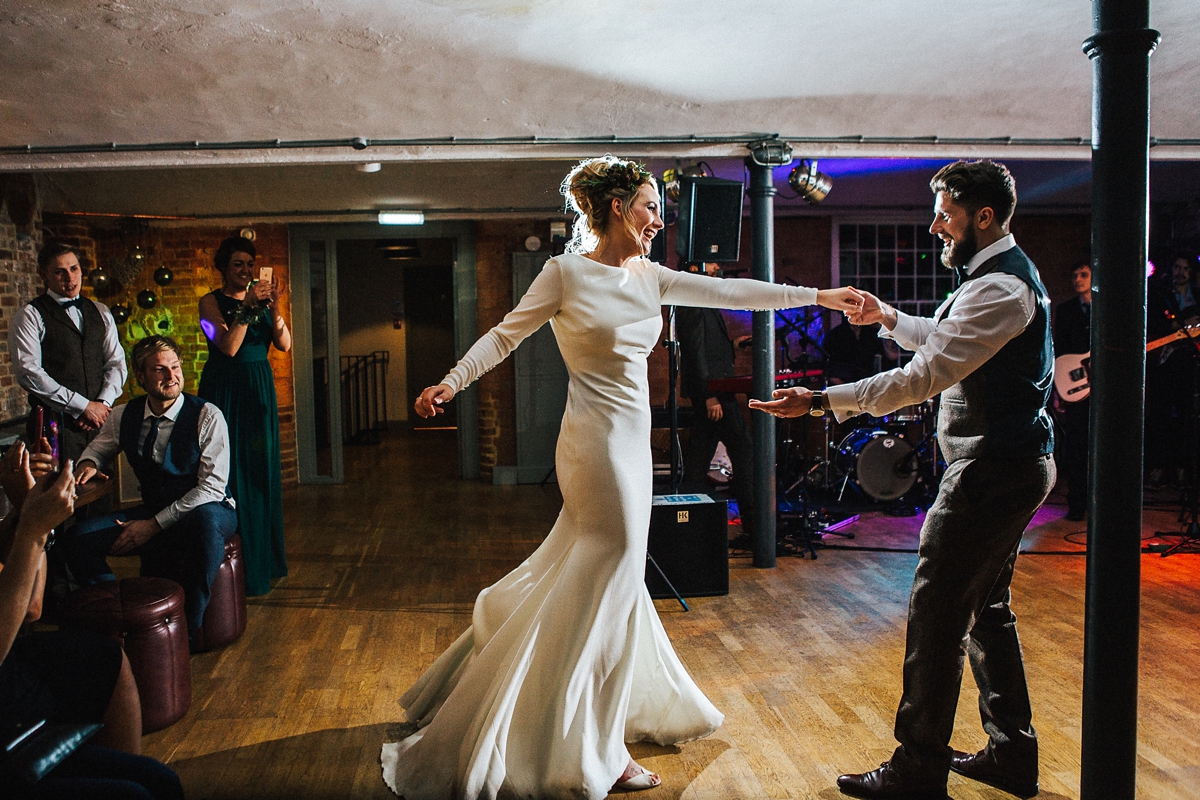 55 A long sleeved Pronovias gown for a glamorous winter wedding at West Mill in Derbyshire