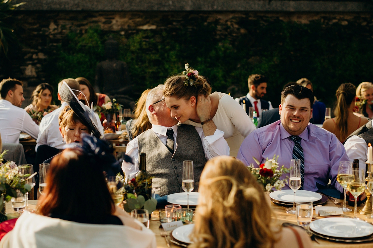 56 A long sleeved Justin Alexander dress for an elegant Glasshouse Wedding