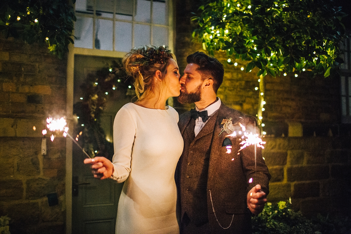 56 A long sleeved Pronovias gown for a glamorous winter wedding at West Mill in Derbyshire