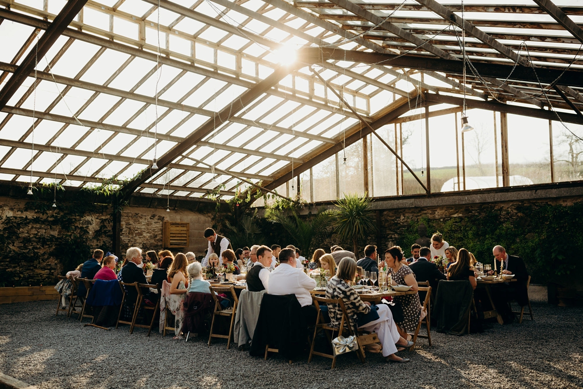 57 A long sleeved Justin Alexander dress for an elegant Glasshouse Wedding