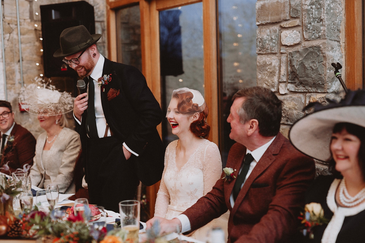 57 A tea length LouLou Bridal dress for a vintage themed farm wedding