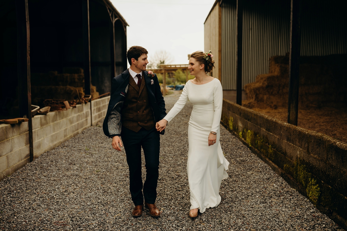 59 A long sleeved Justin Alexander dress for an elegant Glasshouse Wedding