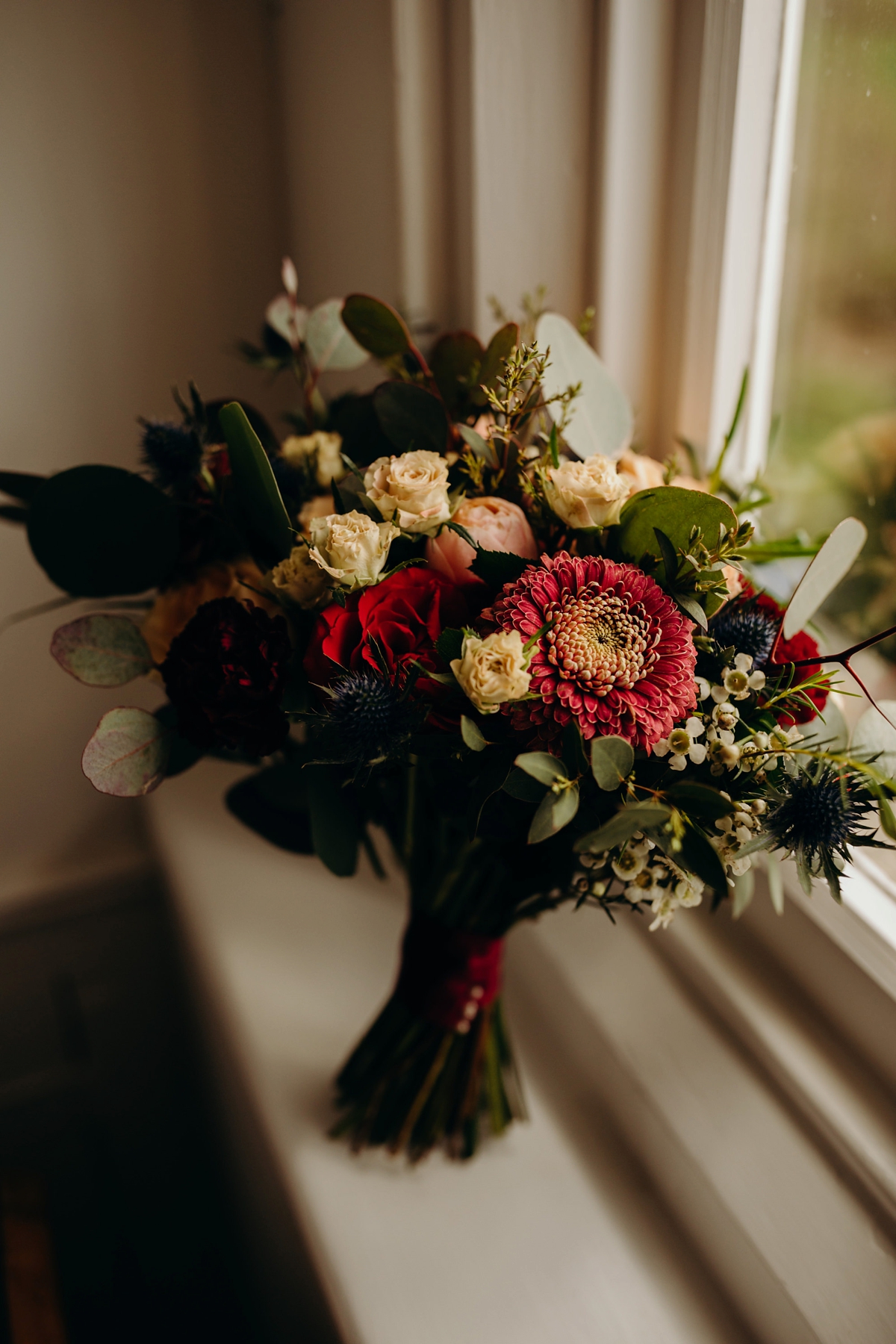 6 A long sleeved Justin Alexander dress for an elegant Glasshouse Wedding