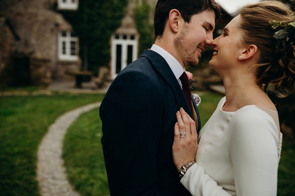 60 A long sleeved Justin Alexander dress for an elegant Glasshouse Wedding