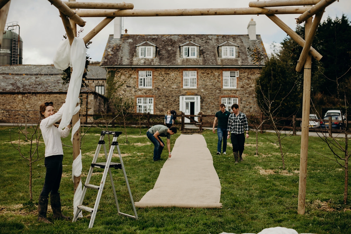 9 A long sleeved Justin Alexander dress for an elegant Glasshouse Wedding