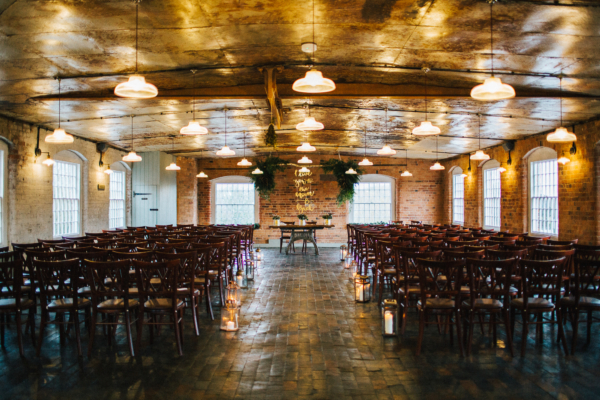 A Long Sleeved, Sleek and Chic Pronovias Dress for a Glamorous Winter Wedding at a Converted Mill