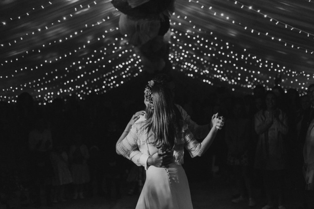 Bride and groom's first dance at a rustic barn wedding in Scotland