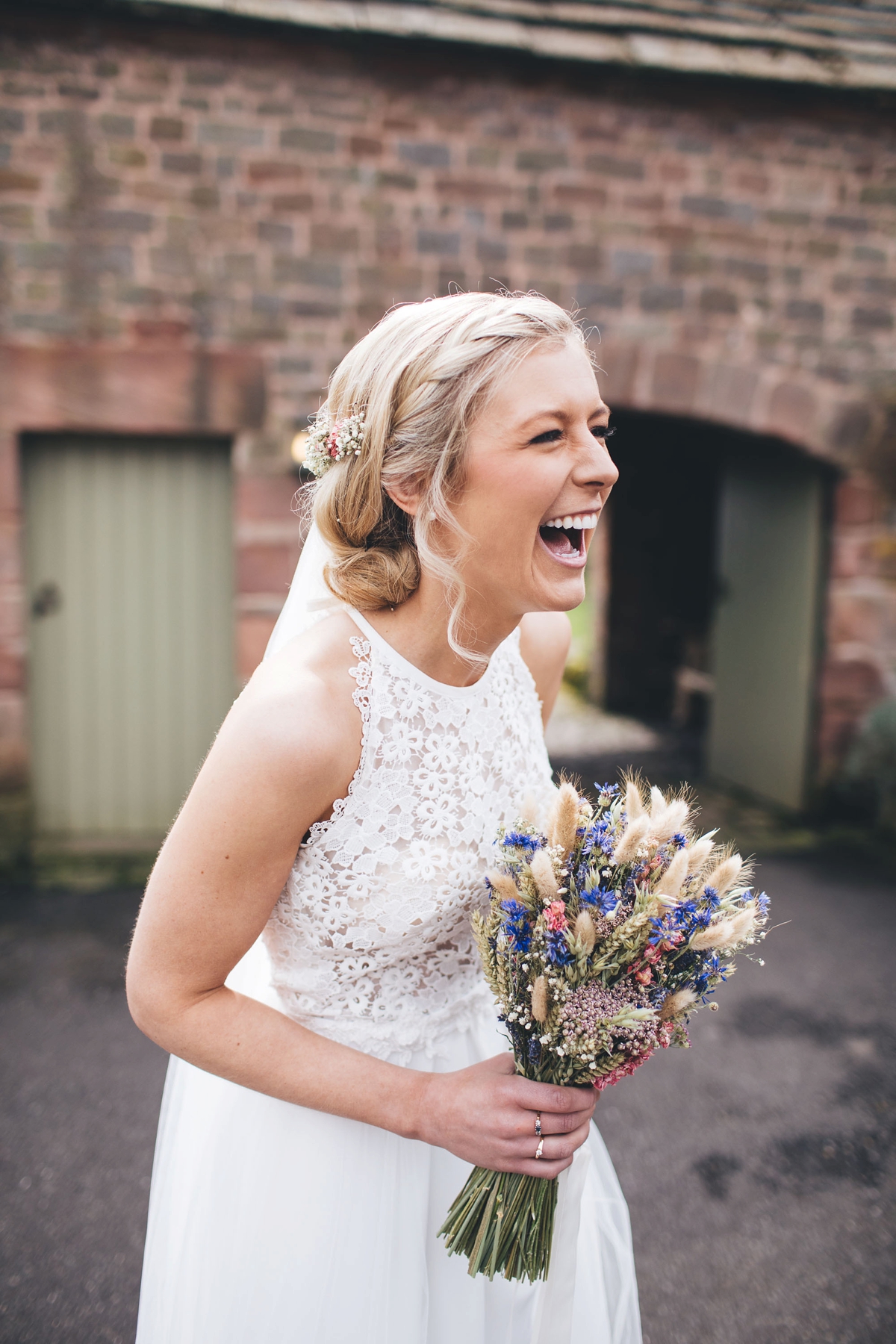 15 A Lambert Creations dress and dried flowers for a rustic barn wedding and online dating love story