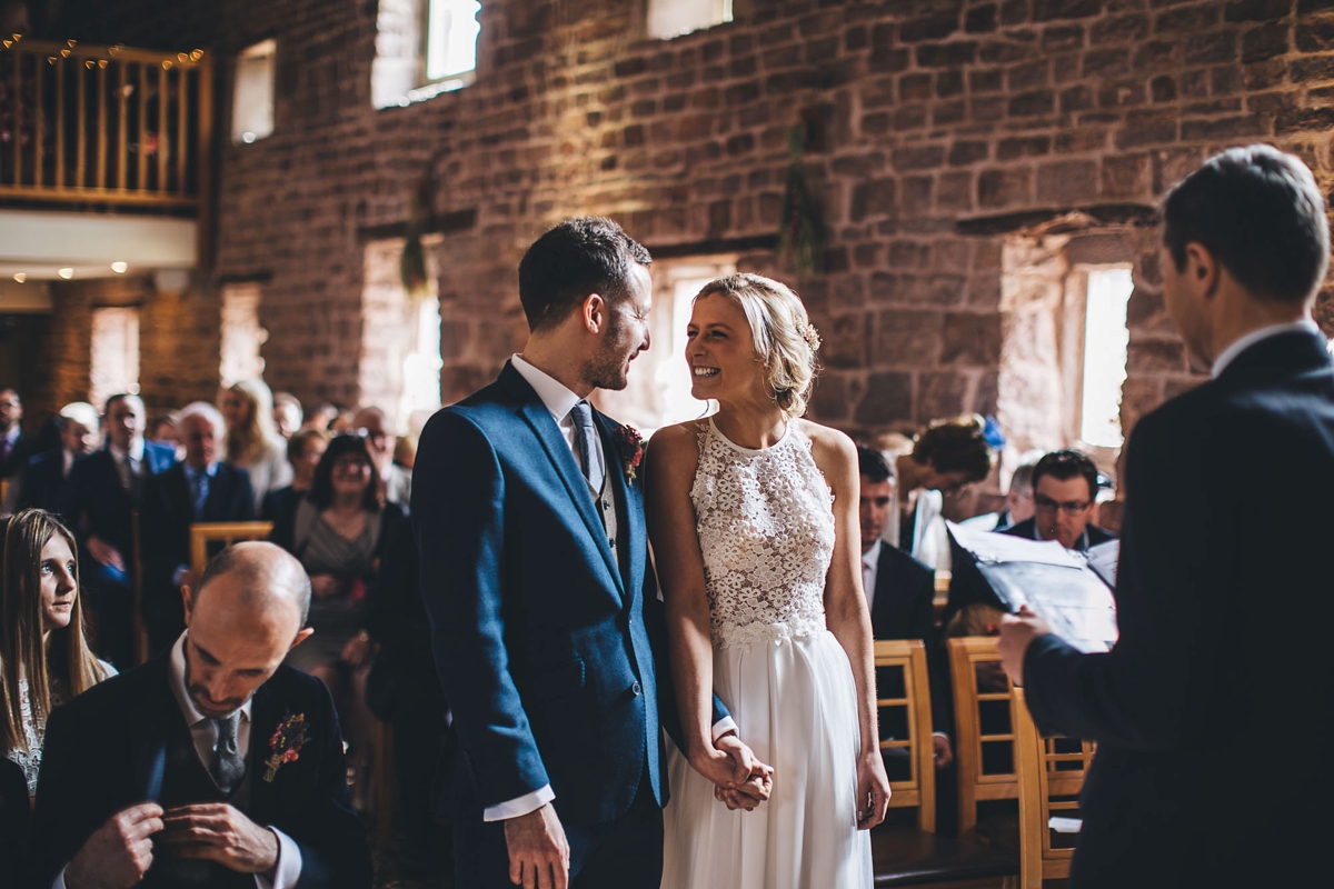 19 A Lambert Creations dress and dried flowers for a rustic barn wedding and online dating love story