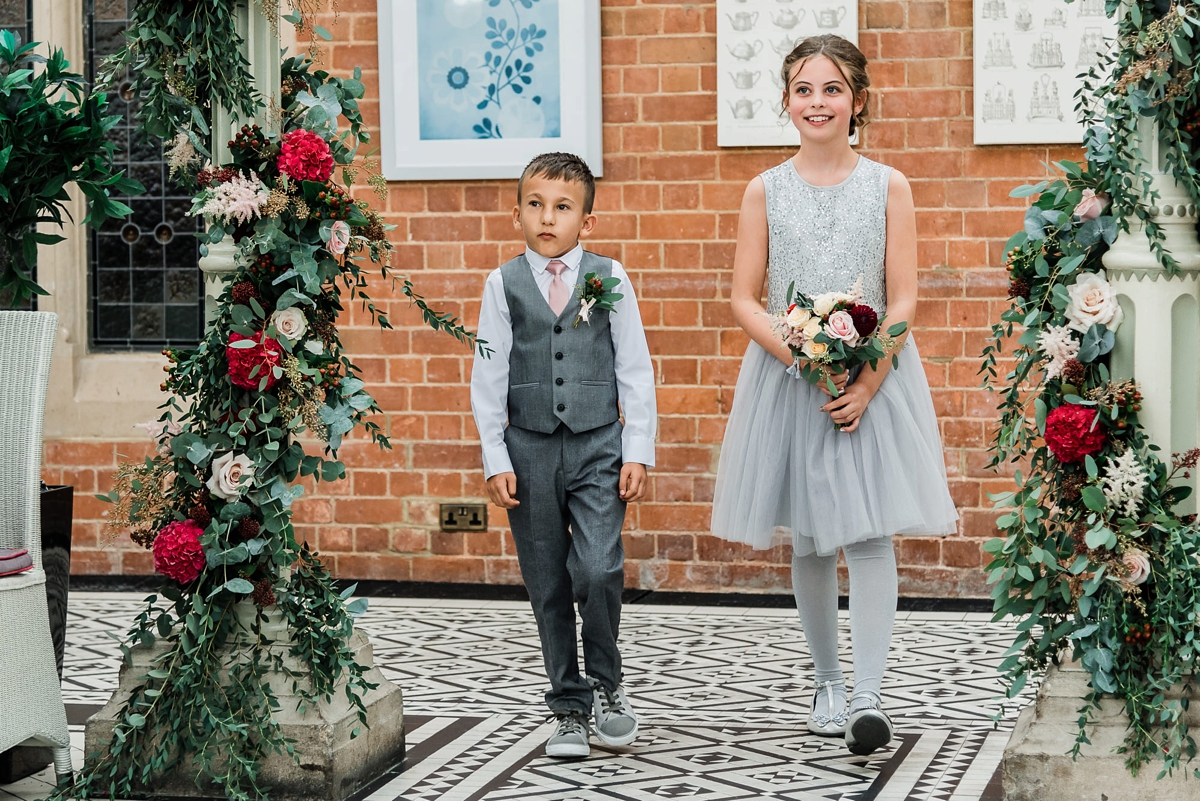 20 Page boy and flower girl in pale grey. Images by Su Ann Simon