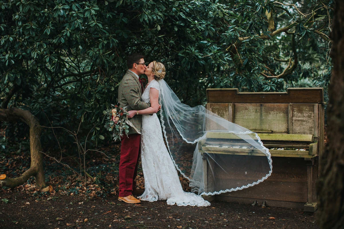 32 A Kenneth Williams gown for a rustic country house wedding on Valentines Day. Image by Lisa Webb Photography