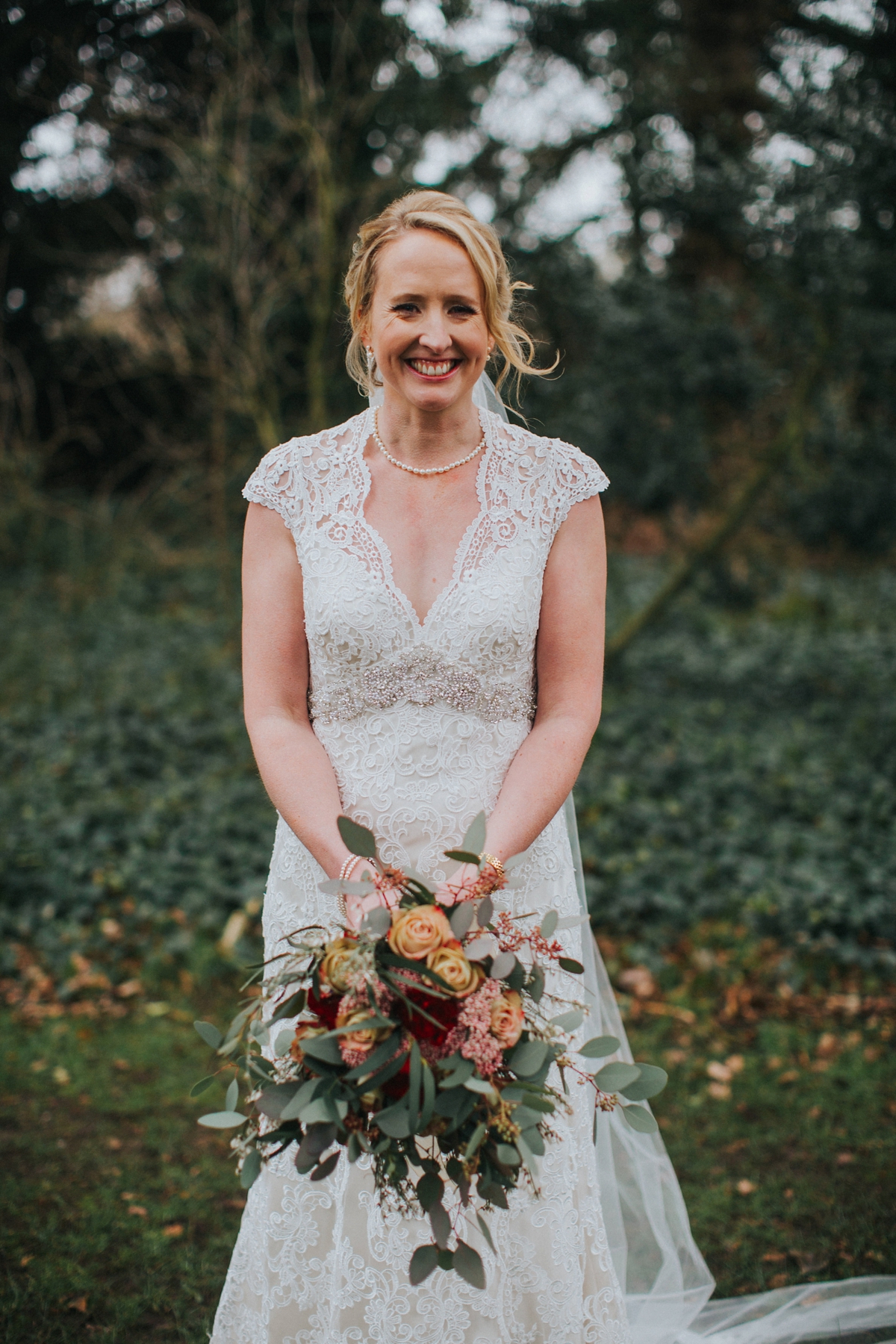 33 A Kenneth Williams gown for a rustic country house wedding on Valentines Day. Image by Lisa Webb Photography