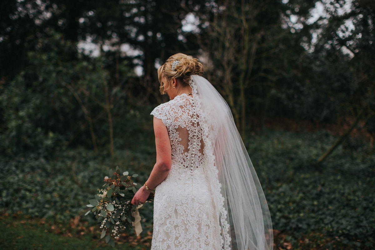 34 A Kenneth Williams gown for a rustic country house wedding on Valentines Day. Image by Lisa Webb Photography