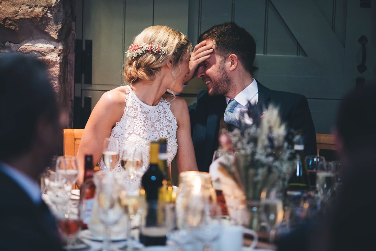 35 A Lambert Creations dress and dried flowers for a rustic barn wedding and online dating love story