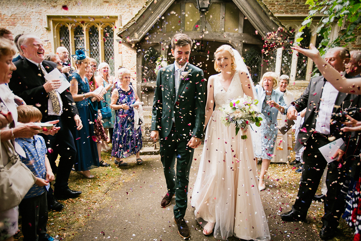 37 A Catherine Deane gown for a childhood sweethearts village hall wedding