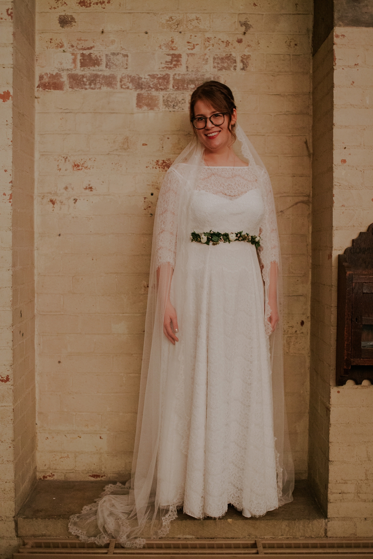 39 A bride in glasses wearing a Kate Beaumont dress for her Leeds city wedding. Images by Jamie Sia