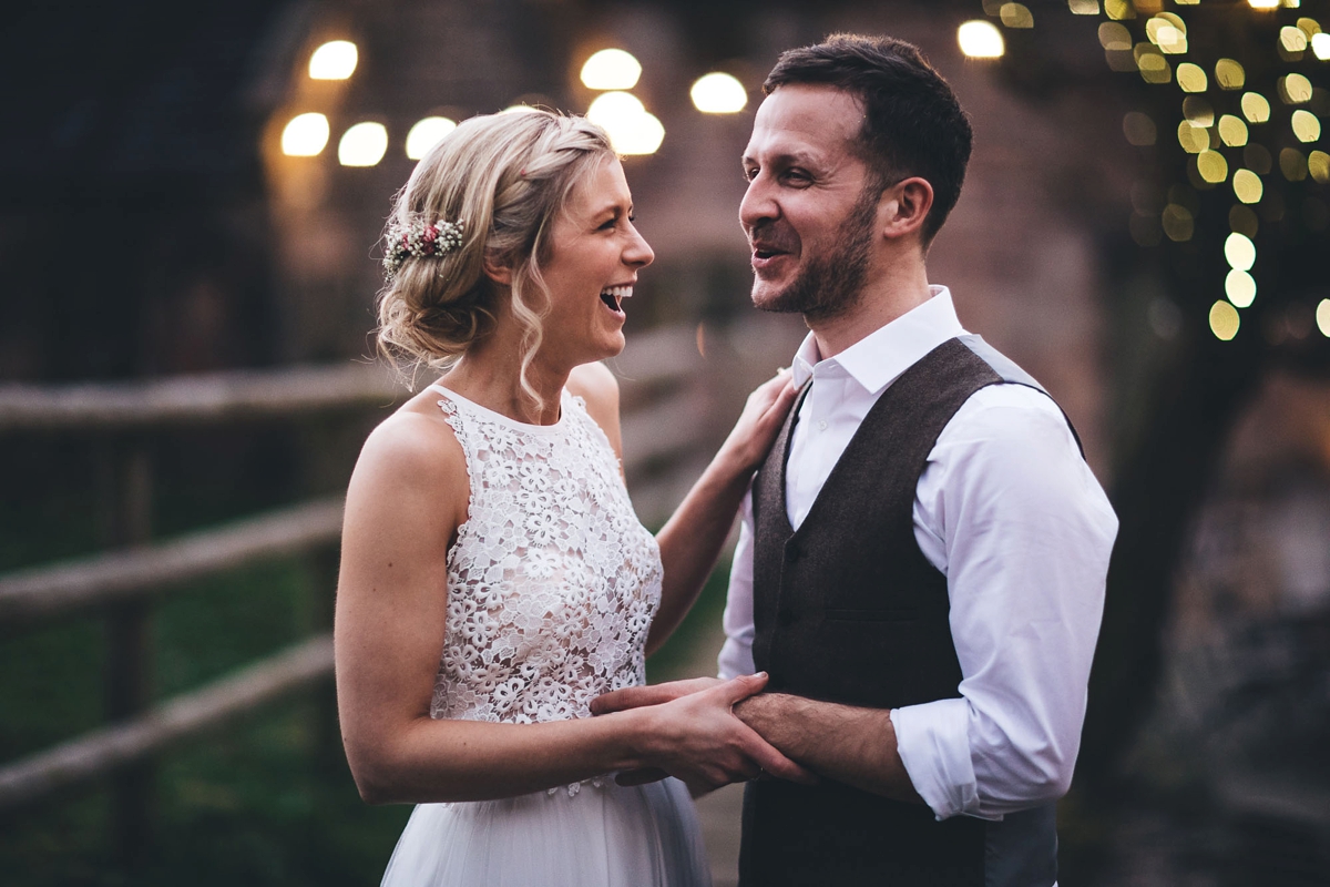 40 A Lambert Creations dress and dried flowers for a rustic barn wedding and online dating love story