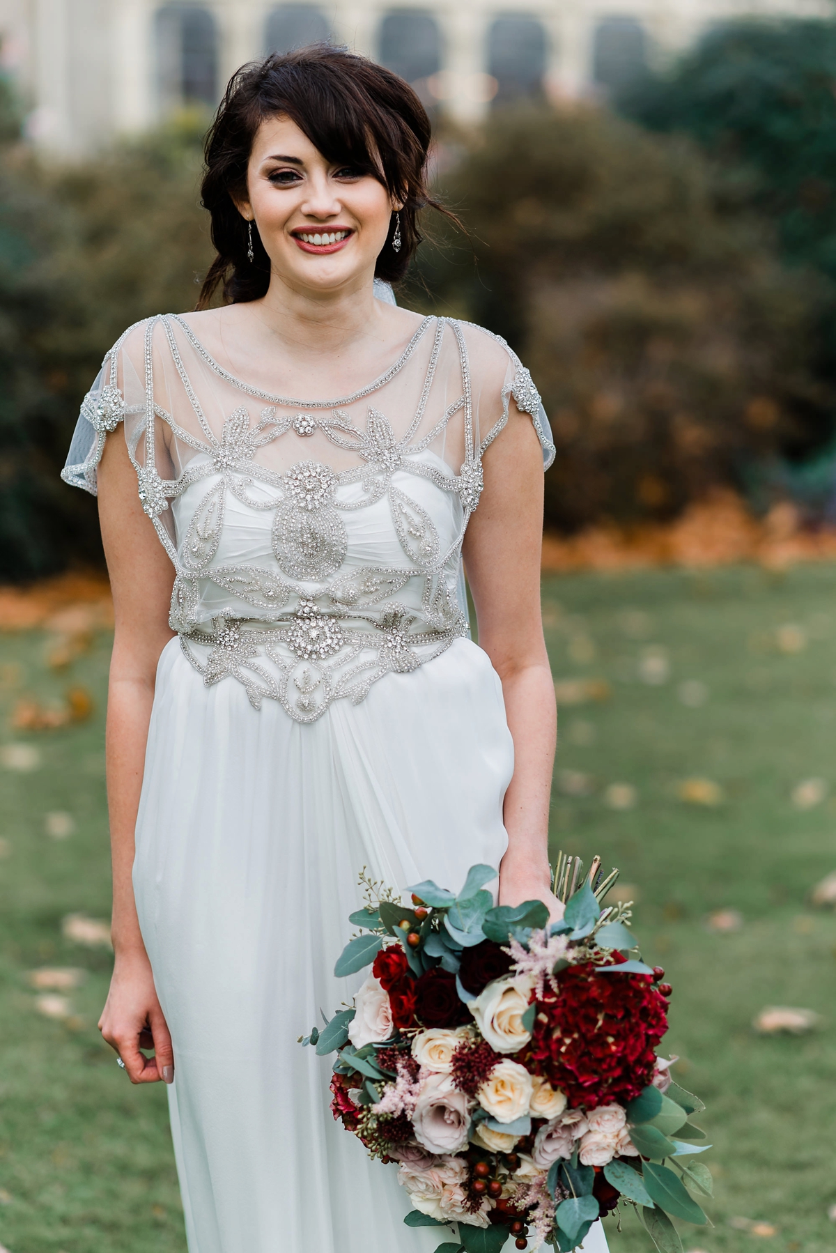 41 Oversized Autumn bridal bouquet by Michelle Gledhill. Bride wears Anna Campbell. Image by Sue Ann Simon