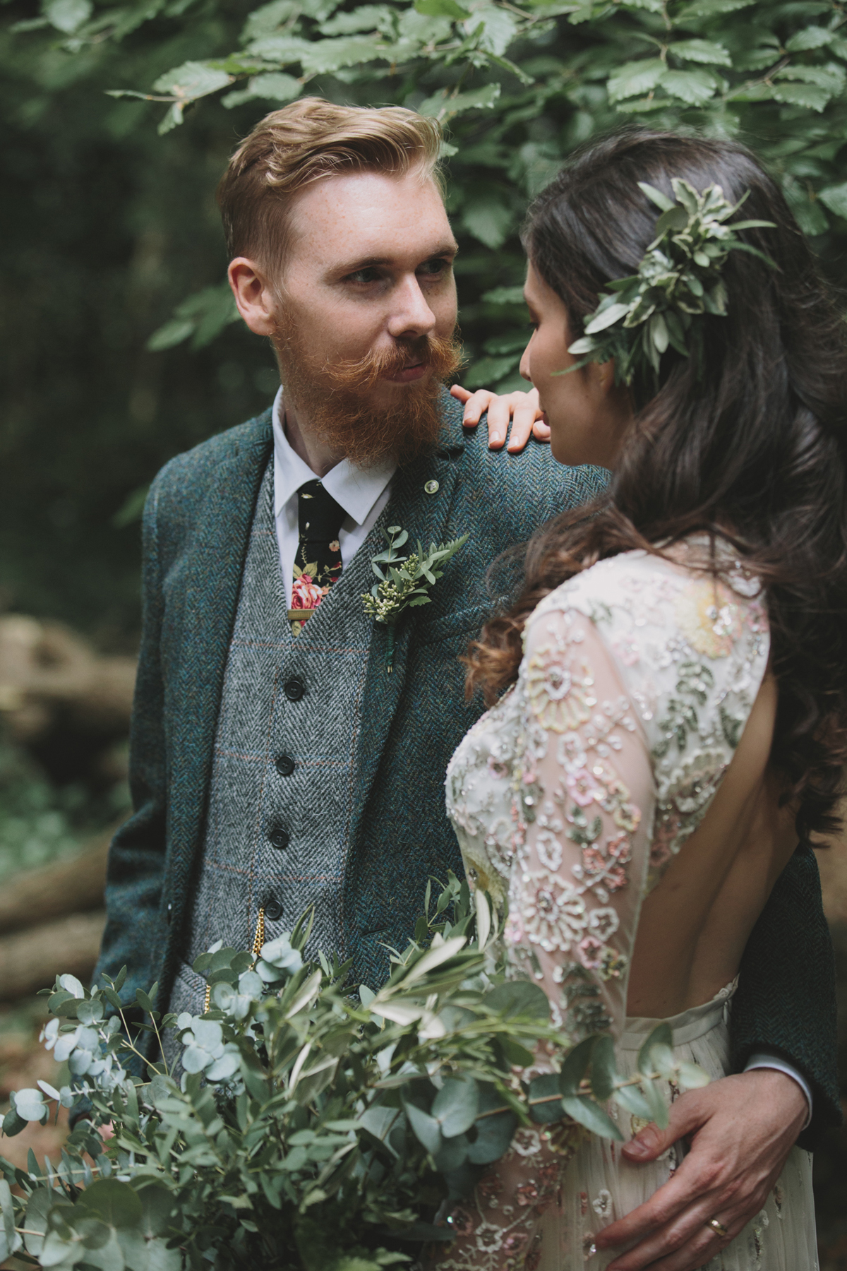63 Bride in a Needle Thread gown and a Groom with a handlebar moustache and ASOS suit standing in woodland image by McKinley Rodgers
