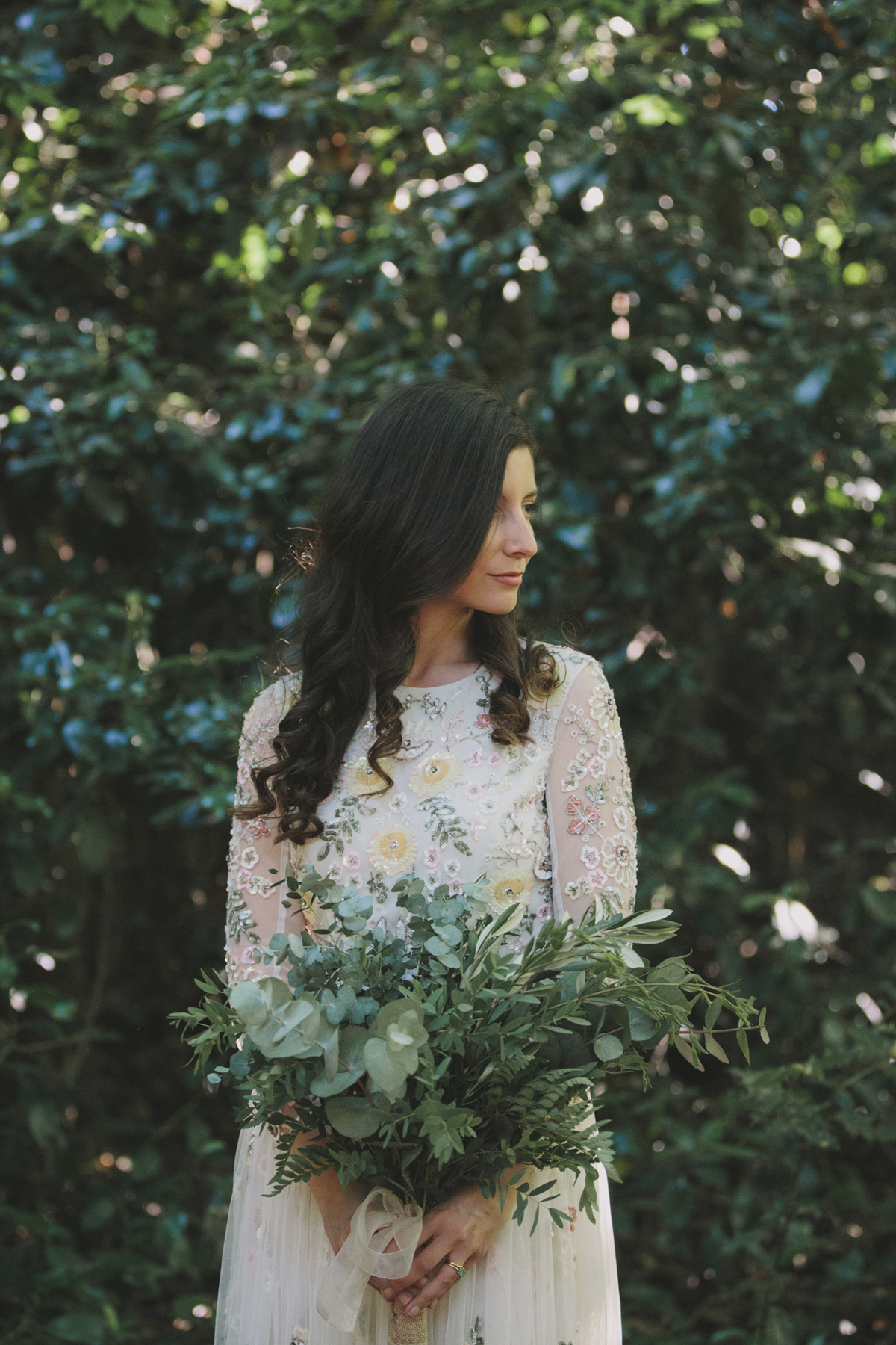 70 Bride in a Needle Thread dress carrying an all green natural and Eucalyptus leaf wedding bouquet image by McKinley Rodgers