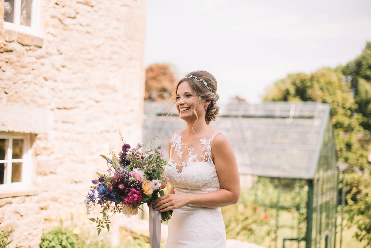 11 A fitted lace Pronovias dress for a colourful walled garden wedding in Northumberland