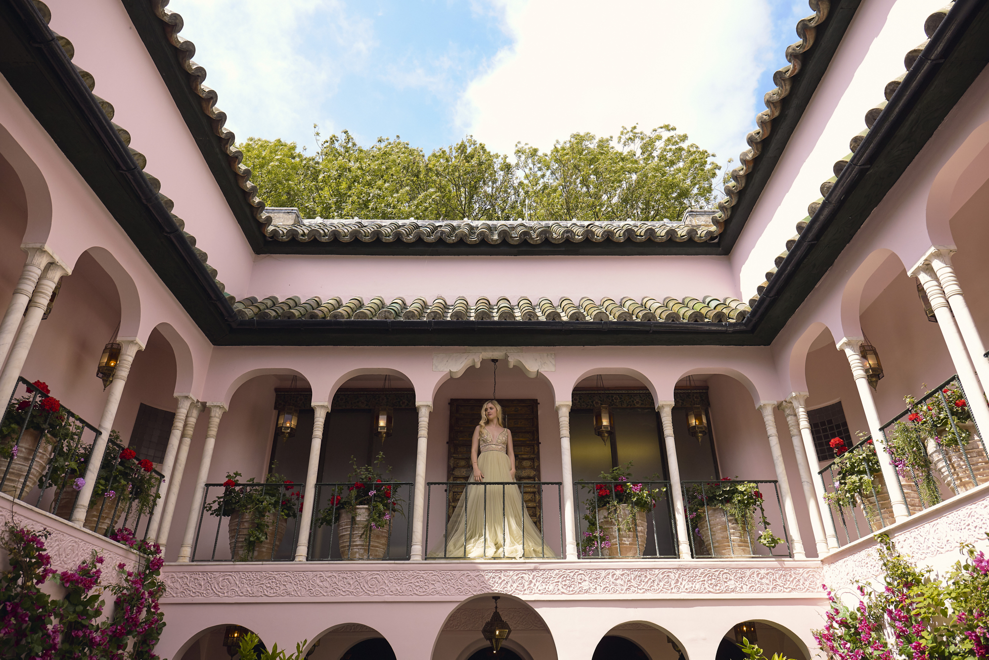 11 Bowen Dryden bridal captured in a pink Marrakech inspired courtyard at Port Lympne Hotel