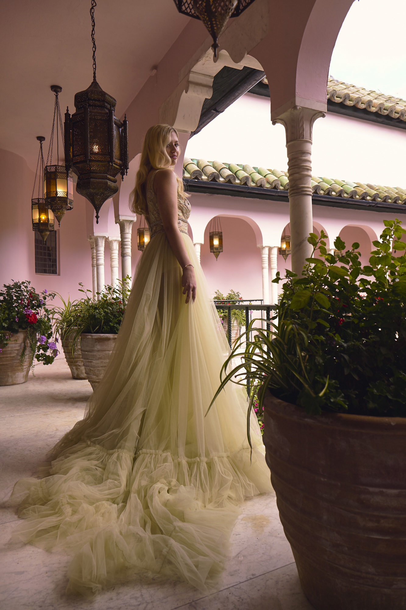 13 Bowen Dryden bridal captured in a pink Marrakech inspired courtyard at Port Lympne Hotel