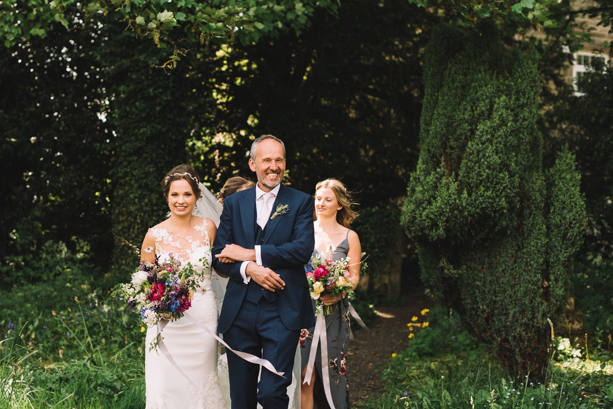 14 A fitted lace Pronovias dress for a colourful walled garden wedding in Northumberland