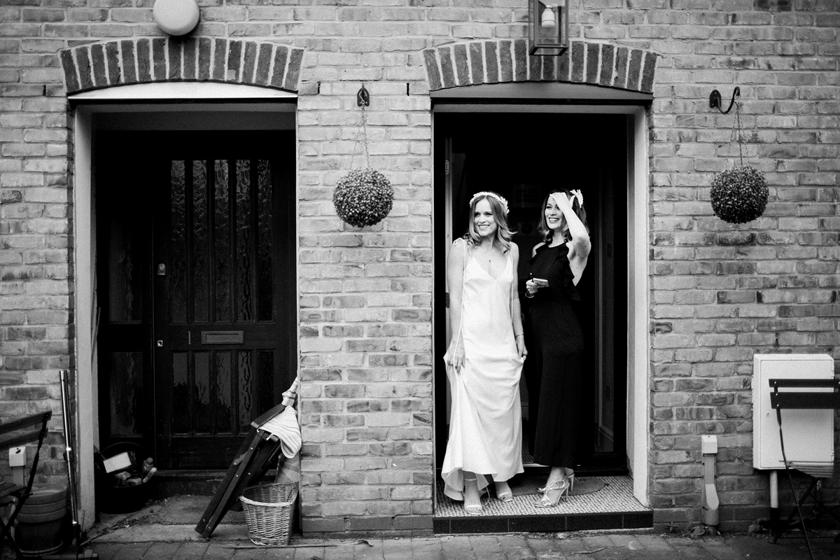 15 A Charlie Brear dress and modern fun East London riverside wedding images by Claudia Rose Carter