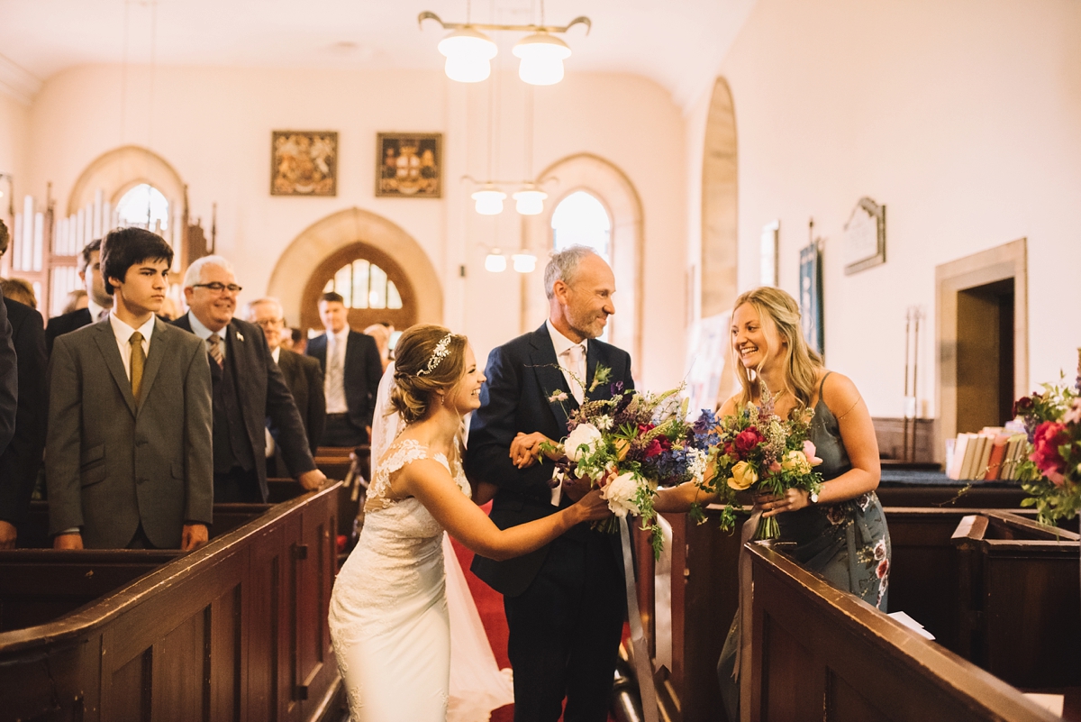 15 A fitted lace Pronovias dress for a colourful walled garden wedding in Northumberland