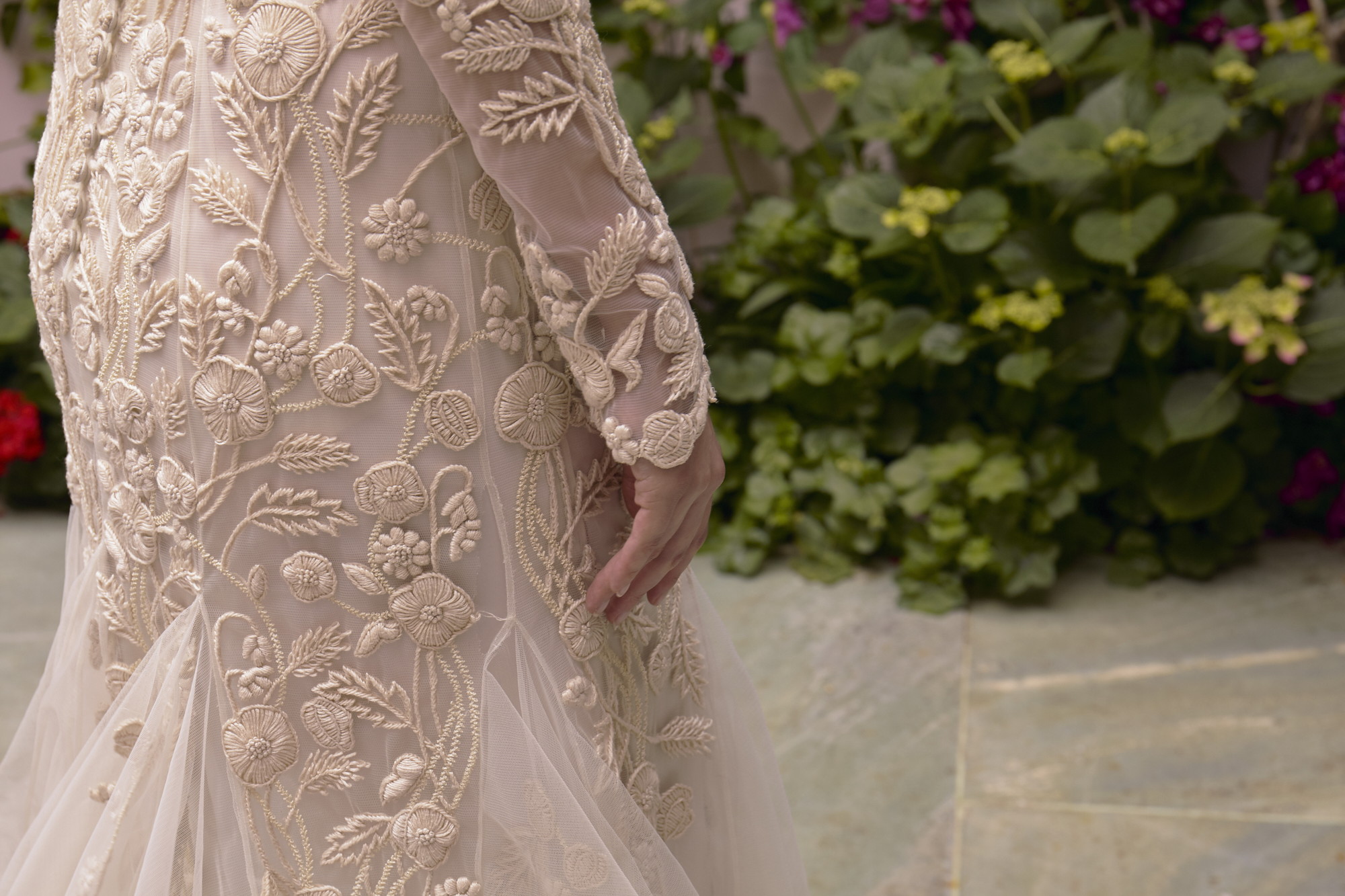 16 Bowen Dryden bridal captured in a pink Marrakech inspired courtyard at Port Lympne Hotel