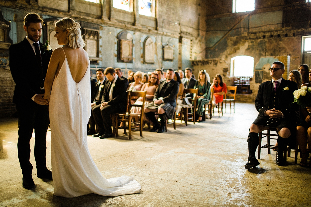 16 For Love wedding dress for a cool and contemporary modern London wedding photography by Claudia Rose Carter - An & For Love Tassel Dress, Olivia The Wolf Headpiece and Bowling Alley Reception For a Cool and Quirky London Wedding 16 For Love wedding dress for a cool and contemporary modern London wedding photography by Claudia Rose Carter