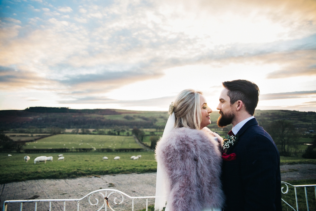 22 A tea length Ronald Joyce gown for an intimate Winter wedding