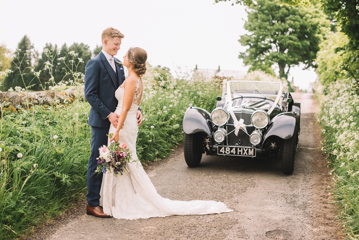 23 A fitted lace Pronovias dress for a colourful walled garden wedding in Northumberland