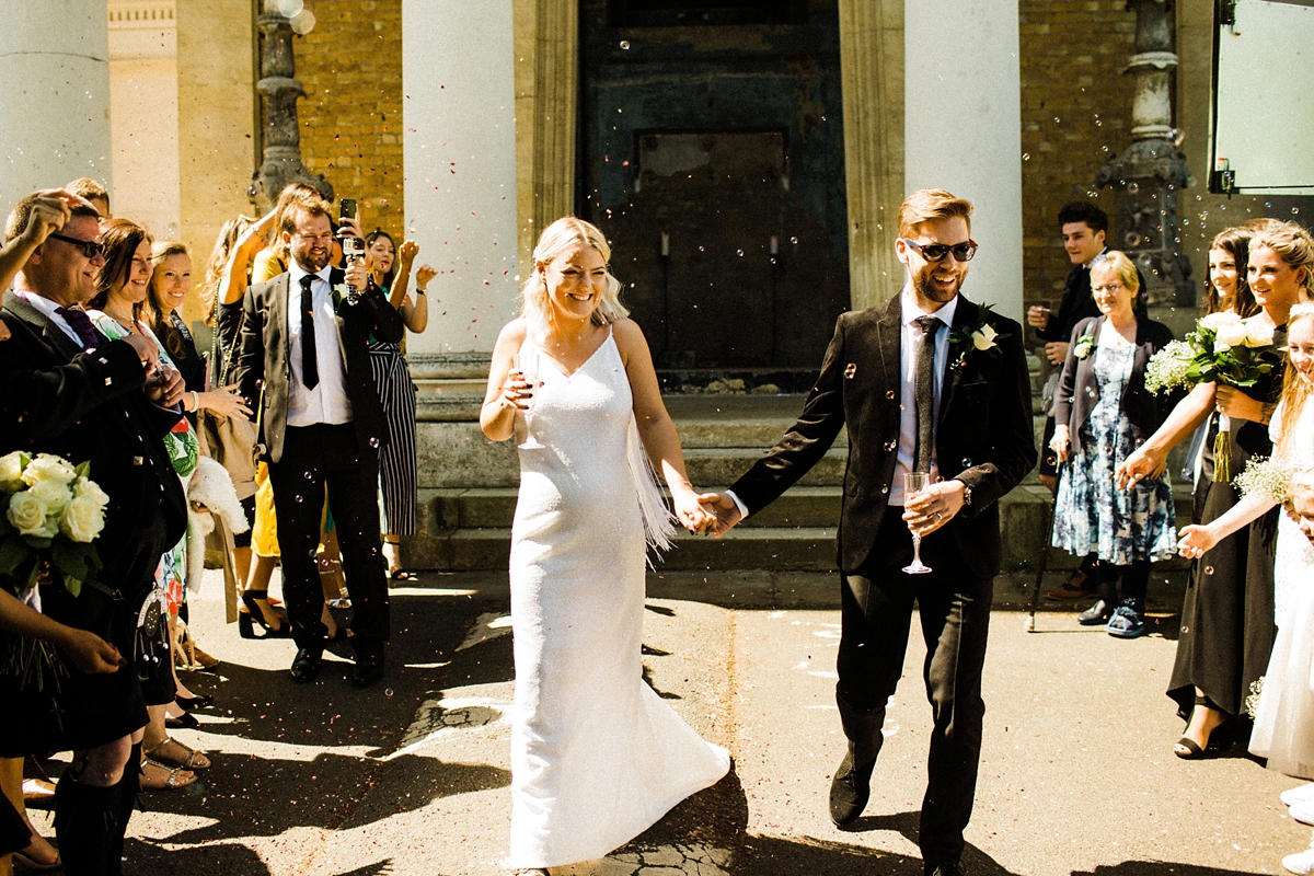 23 For Love wedding dress for a cool and contemporary modern London wedding photography by Claudia Rose Carter - An & For Love Tassel Dress, Olivia The Wolf Headpiece and Bowling Alley Reception For a Cool and Quirky London Wedding 23 For Love wedding dress for a cool and contemporary modern London wedding photography by Claudia Rose Carter
