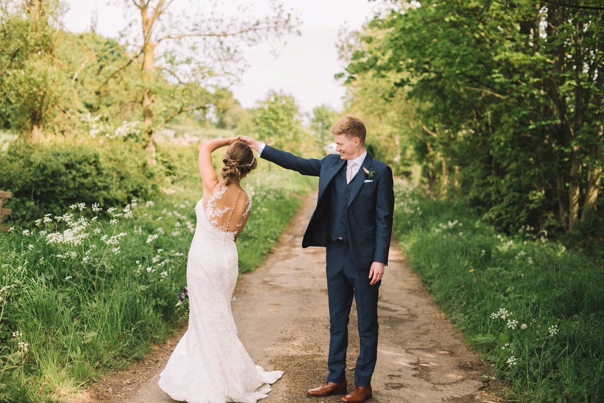 25 A fitted lace Pronovias dress for a colourful walled garden wedding in Northumberland