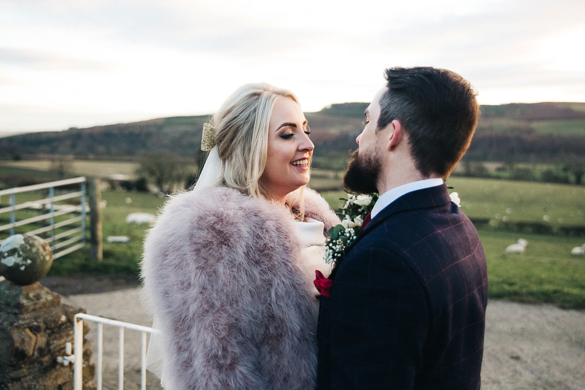 26 A tea length Ronald Joyce gown for an intimate Winter wedding