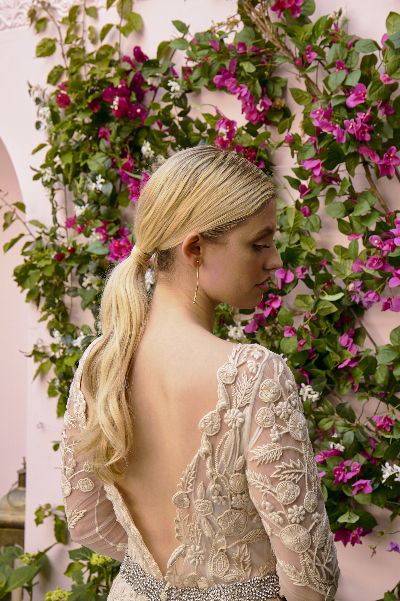 27 Bowen Dryden bridal captured in a pink Marrakech inspired courtyard at Port Lympne Hotel