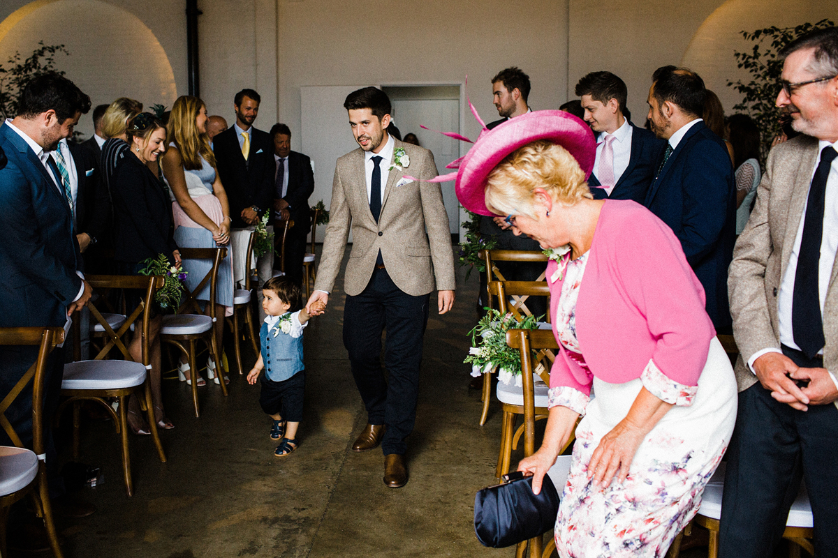 28 A Charlie Brear dress and modern fun East London riverside wedding images by Claudia Rose Carter