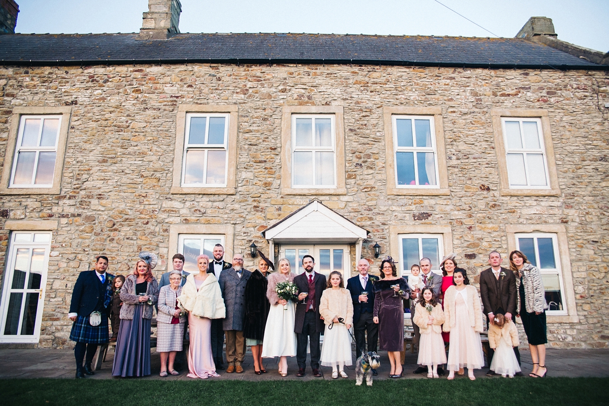 29 A tea length Ronald Joyce gown for an intimate Winter wedding