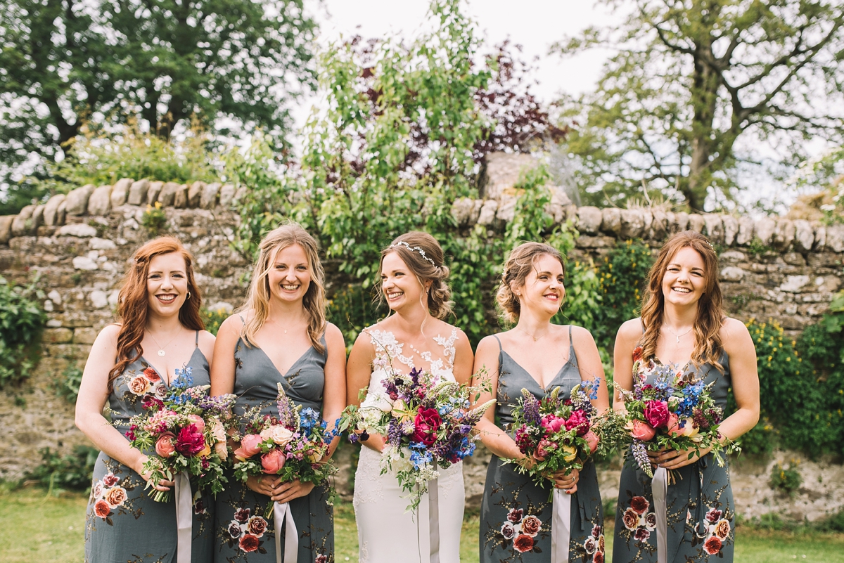 32 A fitted lace Pronovias dress for a colourful walled garden wedding in Northumberland