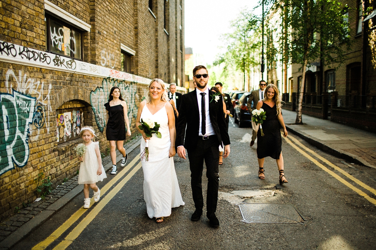 33 For Love wedding dress for a cool and contemporary modern London wedding photography by Claudia Rose Carter - An & For Love Tassel Dress, Olivia The Wolf Headpiece and Bowling Alley Reception For a Cool and Quirky London Wedding 33 For Love wedding dress for a cool and contemporary modern London wedding photography by Claudia Rose Carter