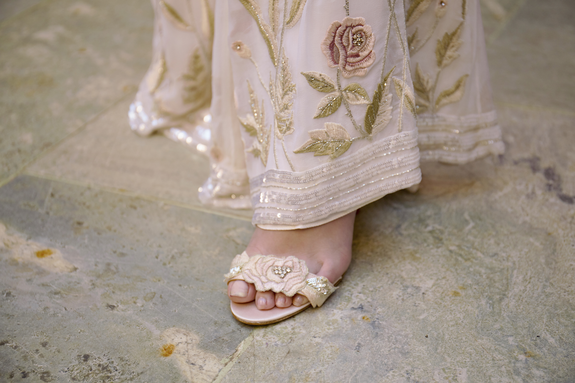 37 Bowen Dryden bridal captured in a pink Marrakech inspired courtyard at Port Lympne Hotel