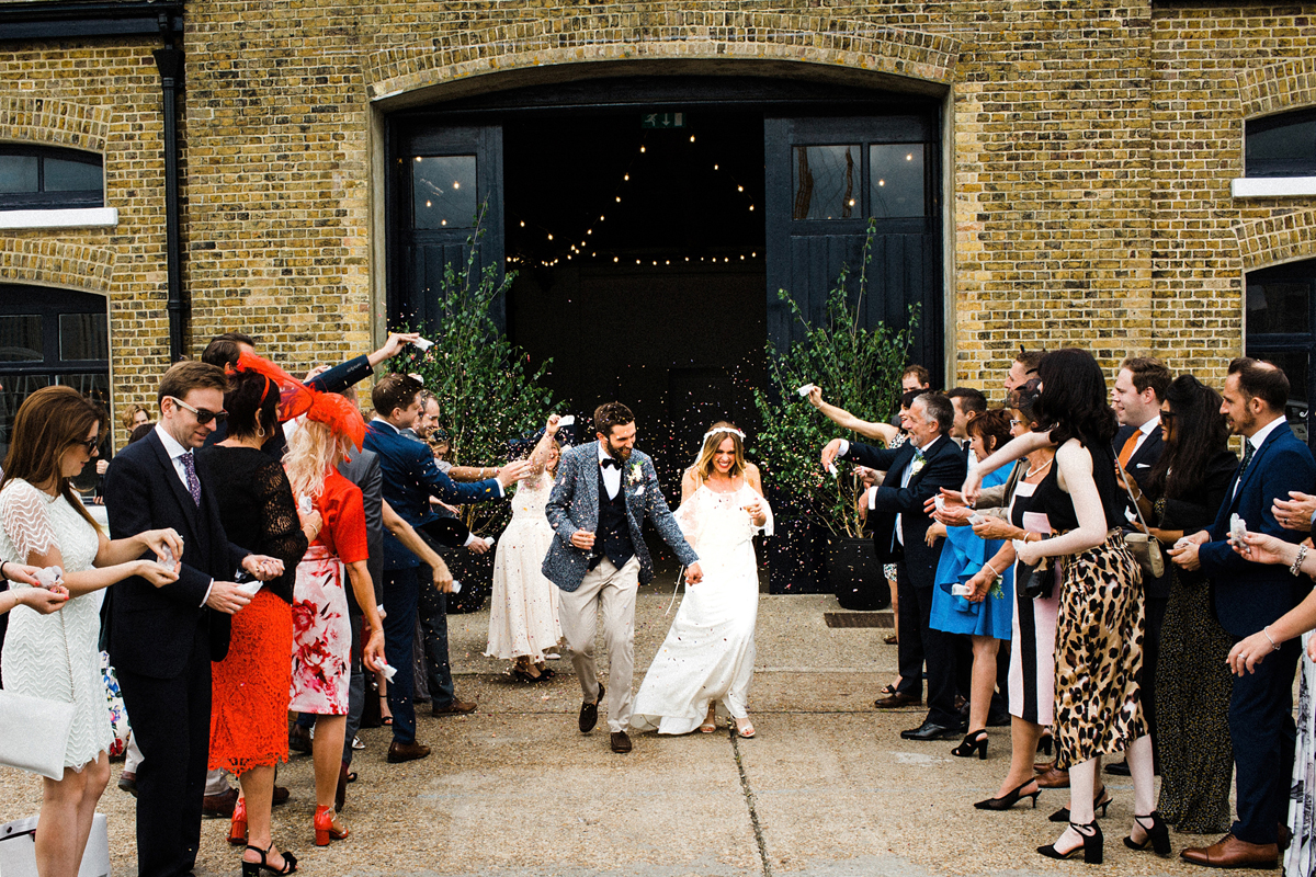 39 A Charlie Brear dress and modern fun East London riverside wedding images by Claudia Rose Carter