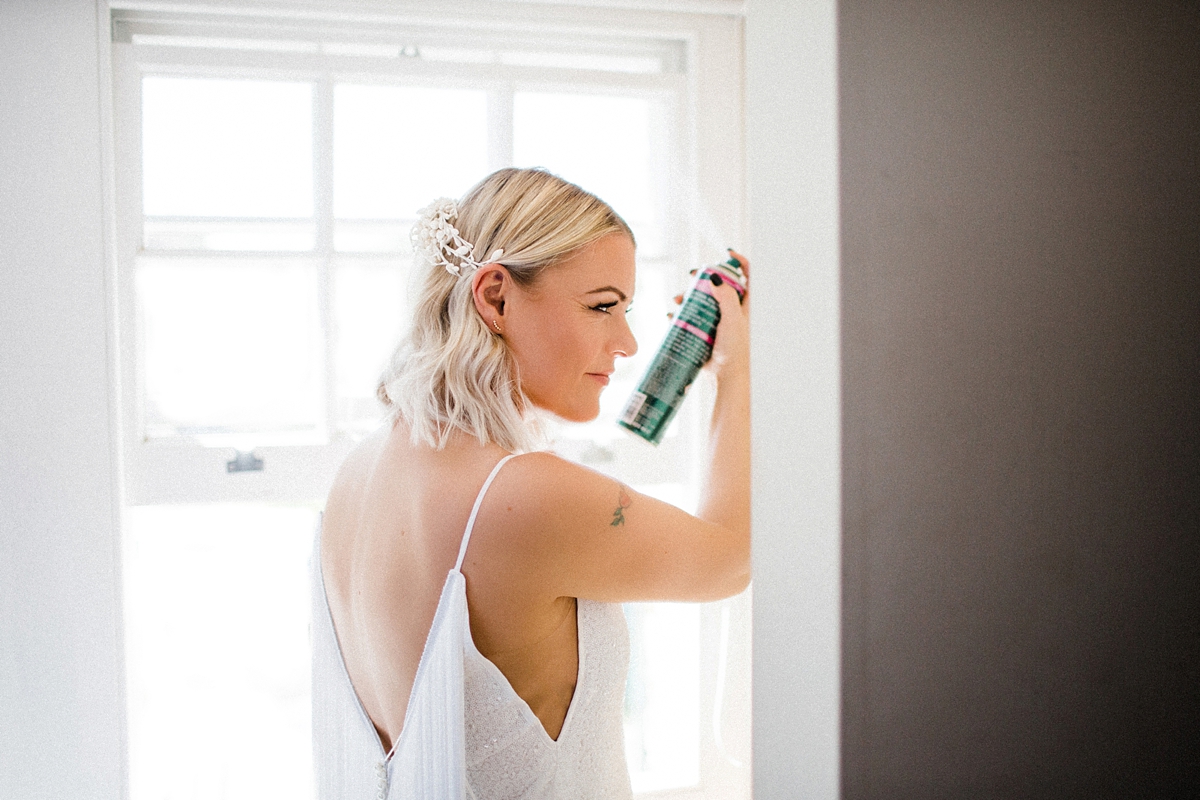 4 For Love wedding dress for a cool and contemporary modern London wedding photography by Claudia Rose Carter - An & For Love Tassel Dress, Olivia The Wolf Headpiece and Bowling Alley Reception For a Cool and Quirky London Wedding 4 For Love wedding dress for a cool and contemporary modern London wedding photography by Claudia Rose Carter