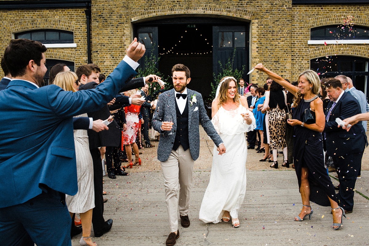 40 A Charlie Brear dress and modern fun East London riverside wedding images by Claudia Rose Carter