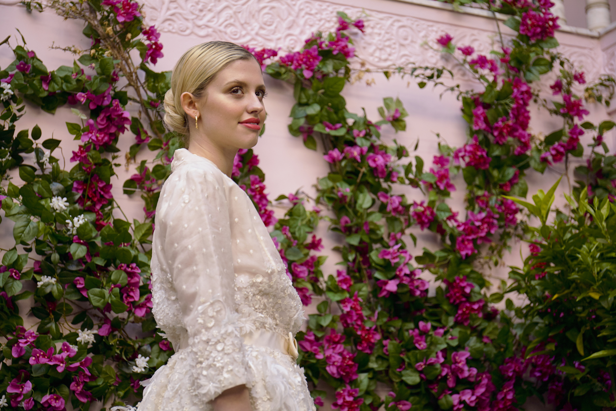 40 Bowen Dryden bridal captured in a pink Marrakech inspired courtyard at Port Lympne Hotel