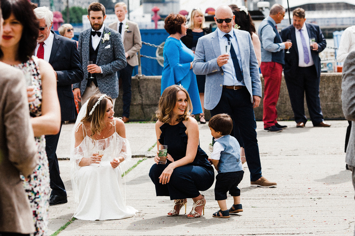 41 A Charlie Brear dress and modern fun East London riverside wedding images by Claudia Rose Carter