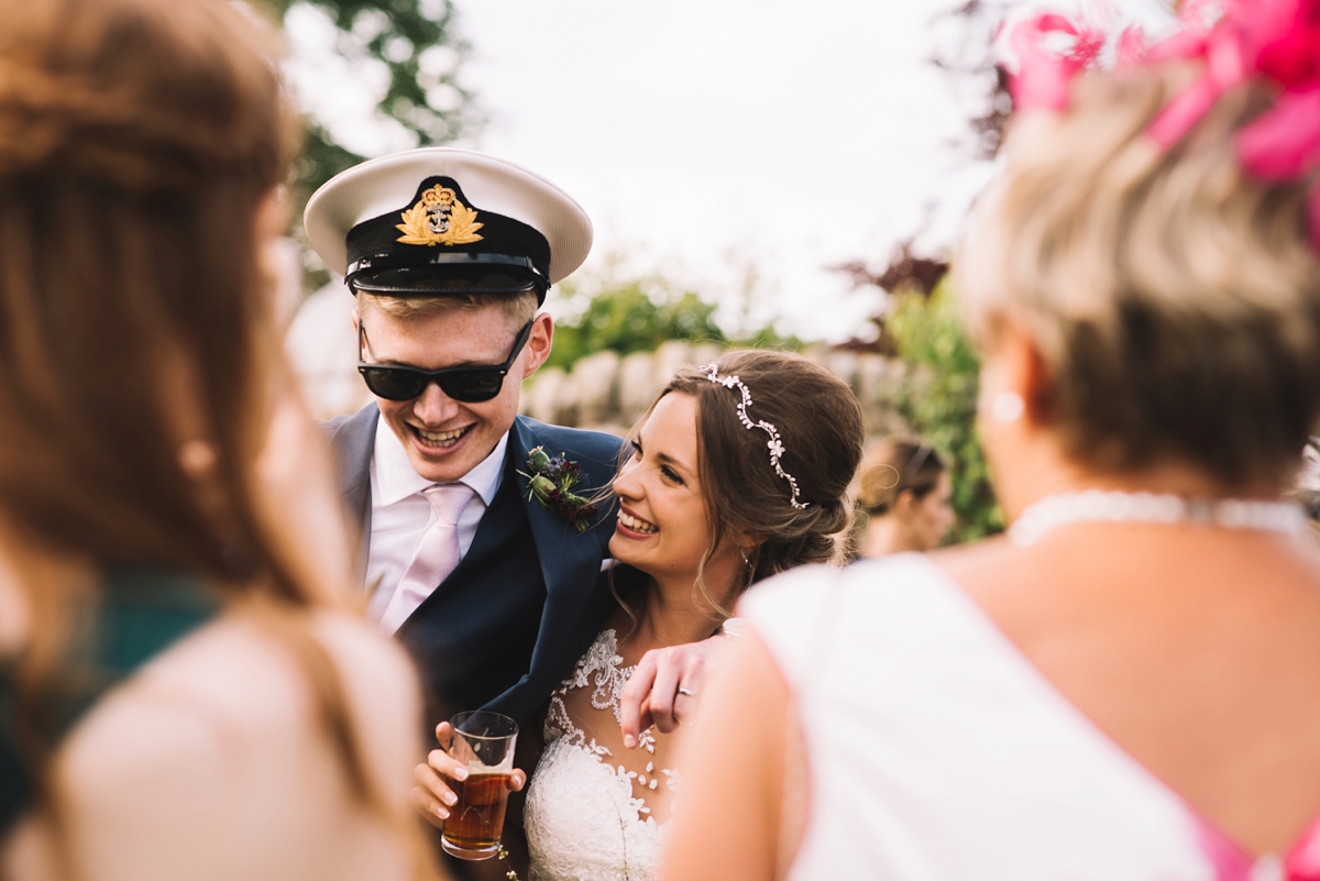 41 A fitted lace Pronovias dress for a colourful walled garden wedding in Northumberland