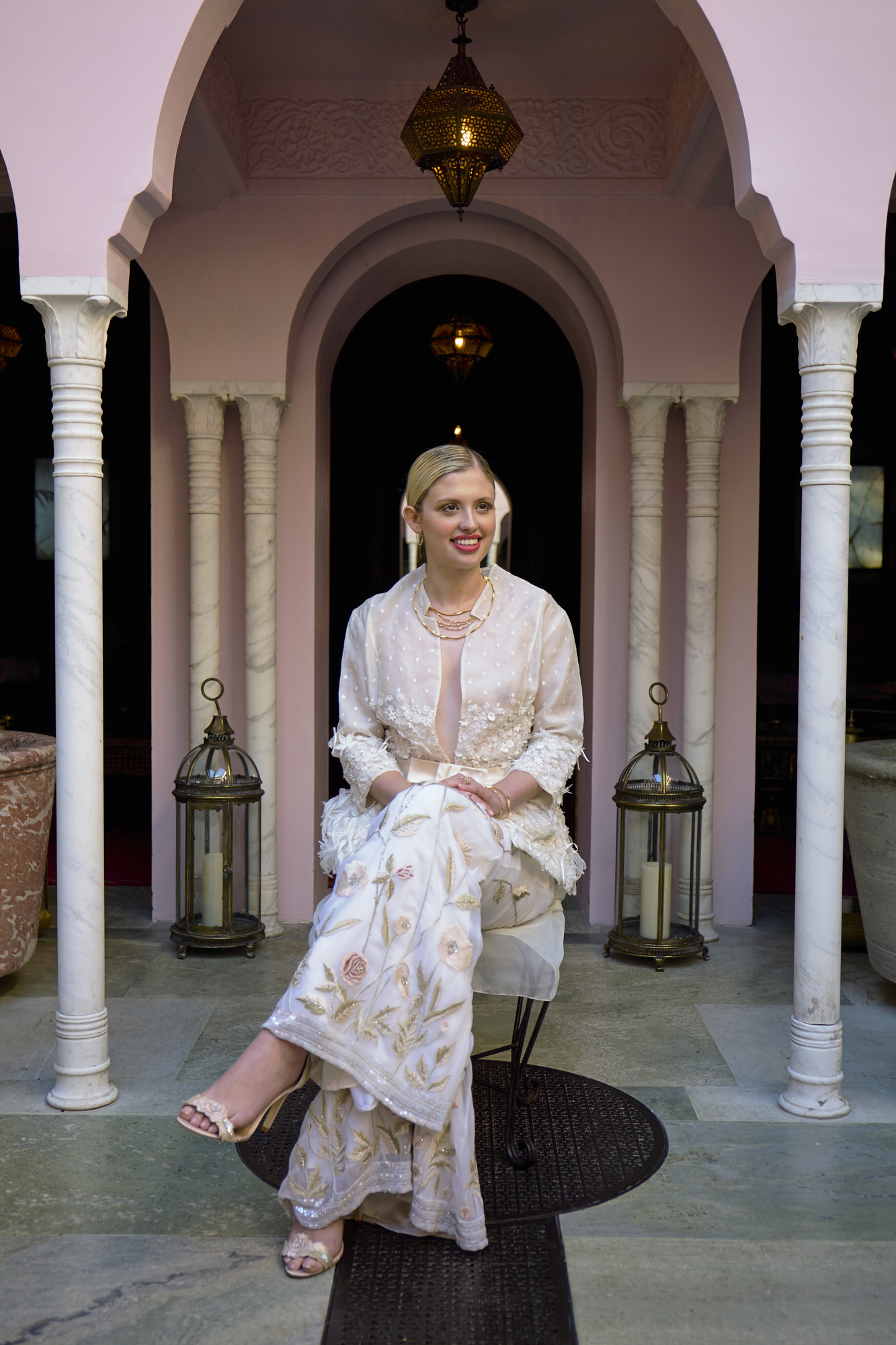 41 Bowen Dryden bridal captured in a pink Marrakech inspired courtyard at Port Lympne Hotel